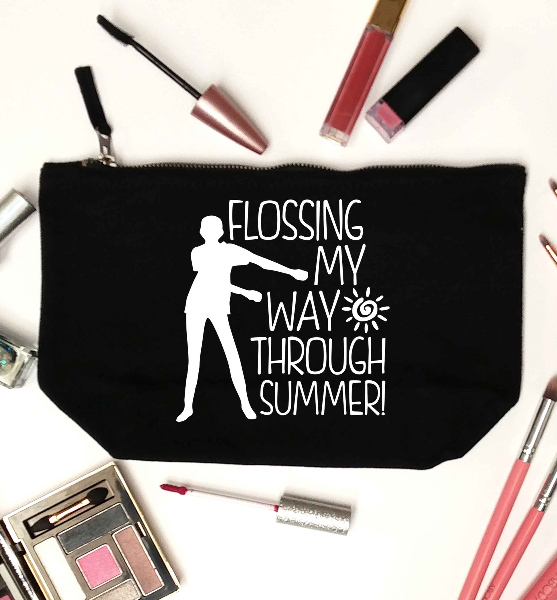 Flossing my way through summer black makeup bag