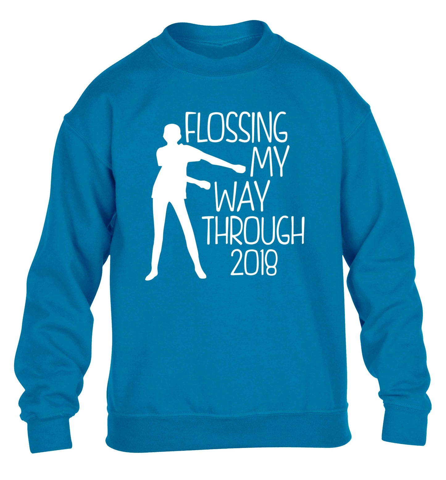 Flossing my way through 2018 children's blue sweater 12-13 Years