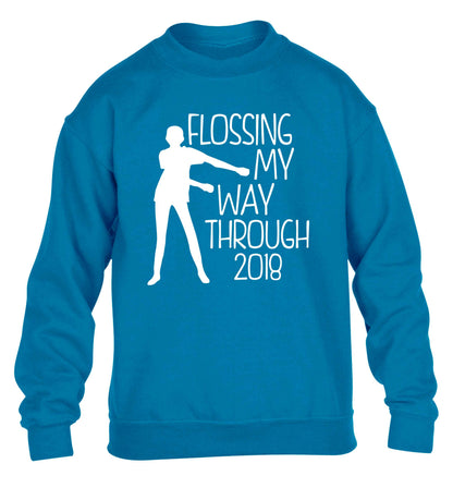 Flossing my way through 2018 children's blue sweater 12-13 Years