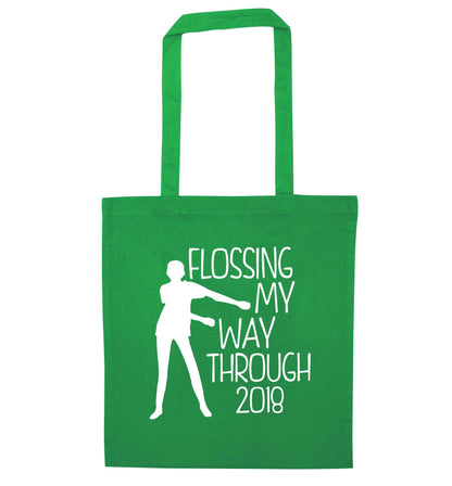 Flossing my way through 2018 green tote bag