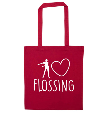 I love flossing red tote bag
