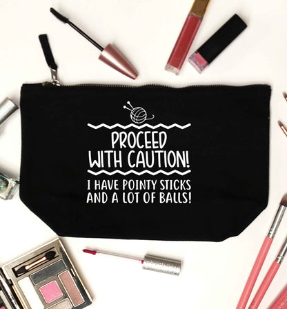 Proceed with caution, I have pointy sticks and a lot of balls black makeup bag