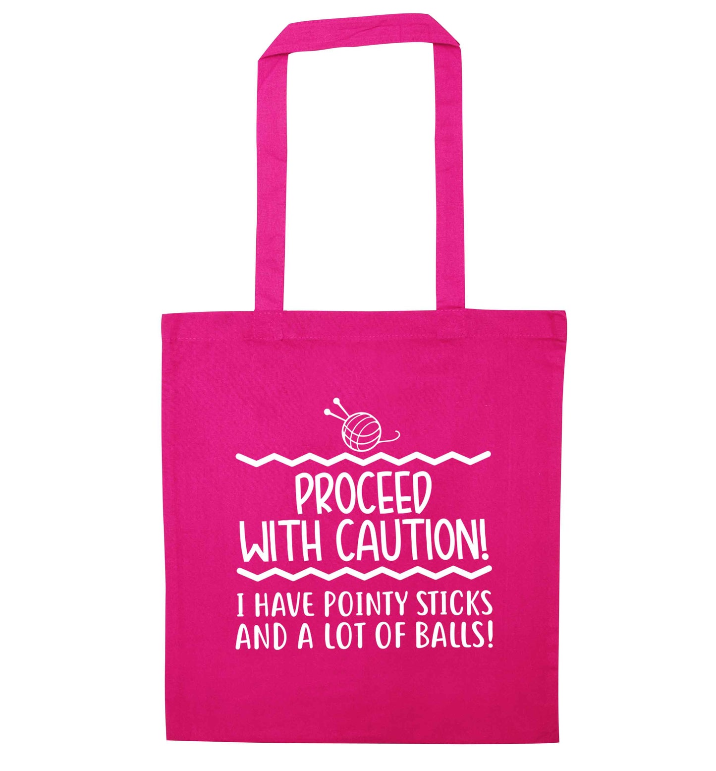 Proceed with caution, I have pointy sticks and a lot of balls pink tote bag