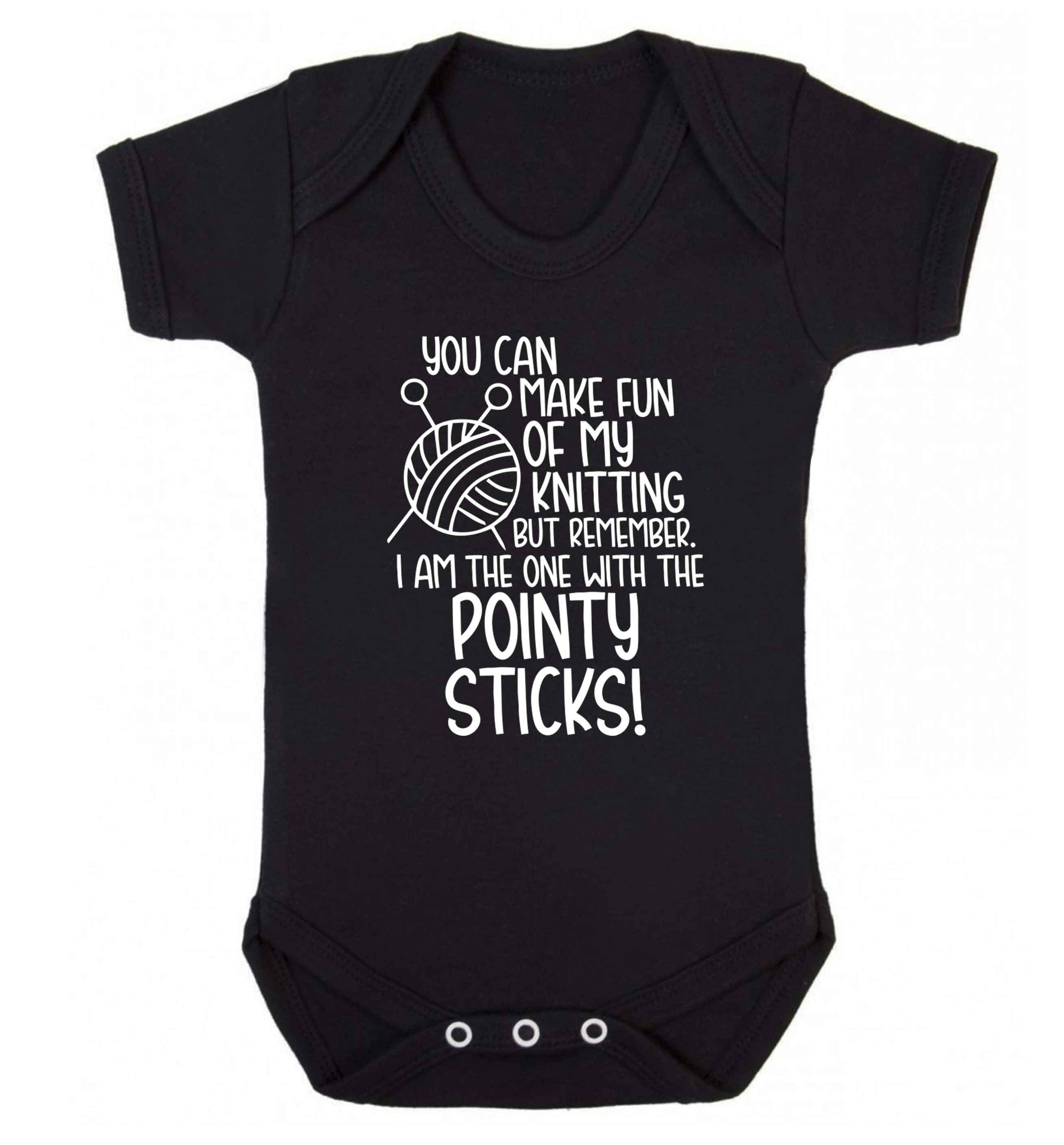 You can make fun of my knitting but remember. I'm the one with the pointy sticks! Baby Vest black 18-24 months
