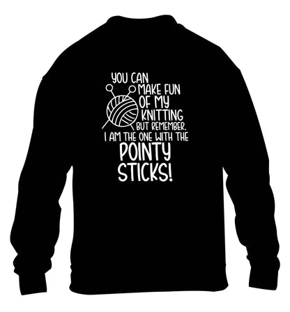 You can make fun of my knitting but remember. I'm the one with the pointy sticks! children's black sweater 12-13 Years