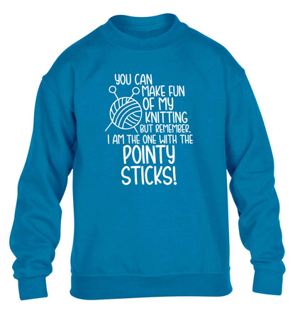 You can make fun of my knitting but remember. I'm the one with the pointy sticks! children's blue sweater 12-13 Years
