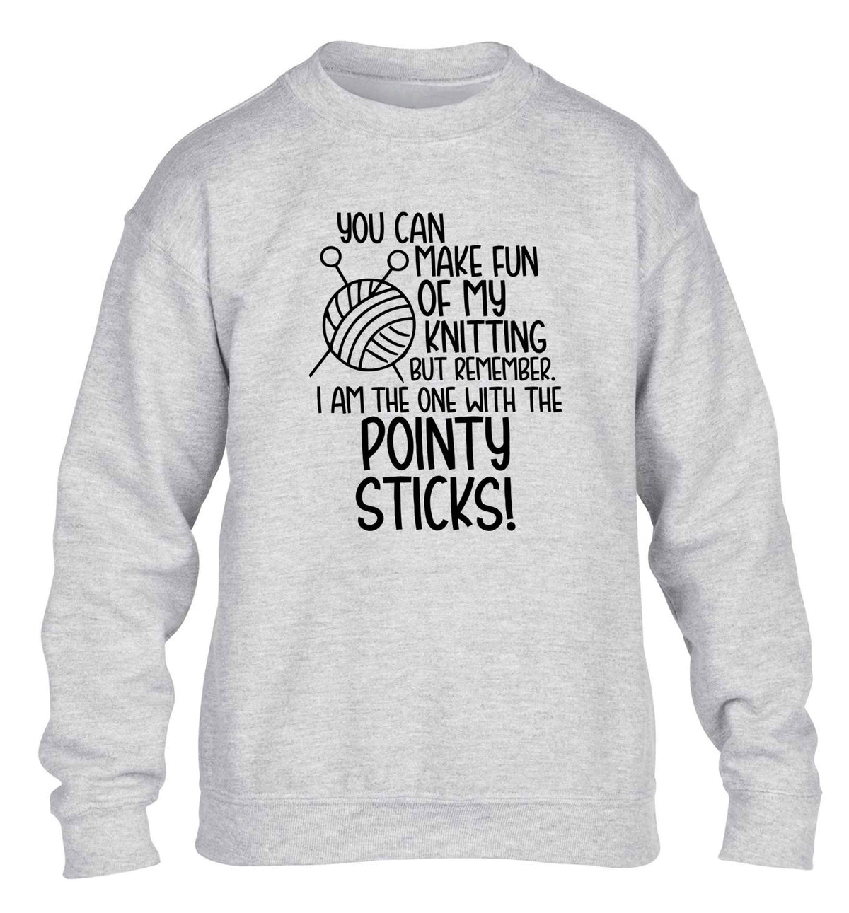 You can make fun of my knitting but remember. I'm the one with the pointy sticks! children's grey sweater 12-13 Years