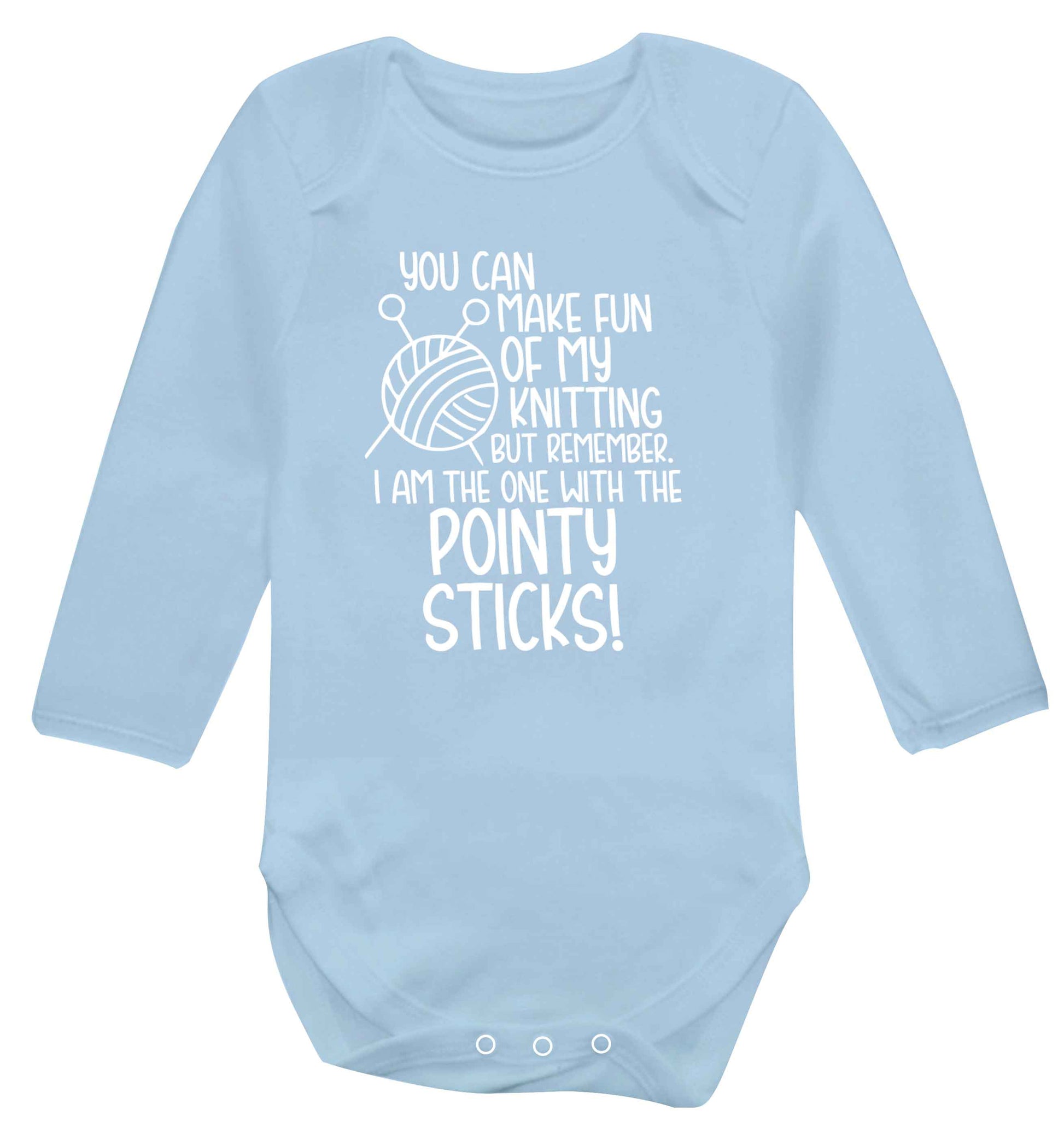 You can make fun of my knitting but remember. I'm the one with the pointy sticks! Baby Vest long sleeved pale blue 6-12 months