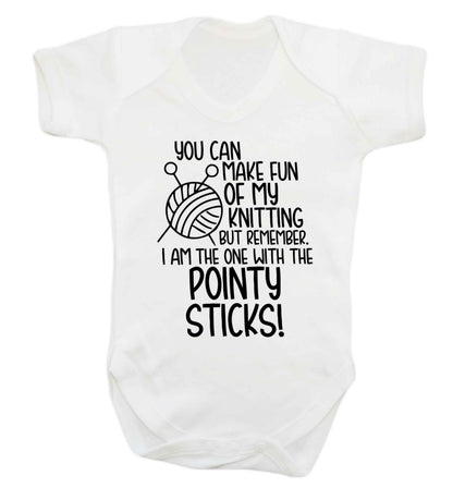 You can make fun of my knitting but remember. I'm the one with the pointy sticks! Baby Vest white 18-24 months