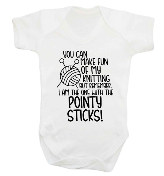 You can make fun of my knitting but remember. I'm the one with the pointy sticks! Baby Vest white 18-24 months