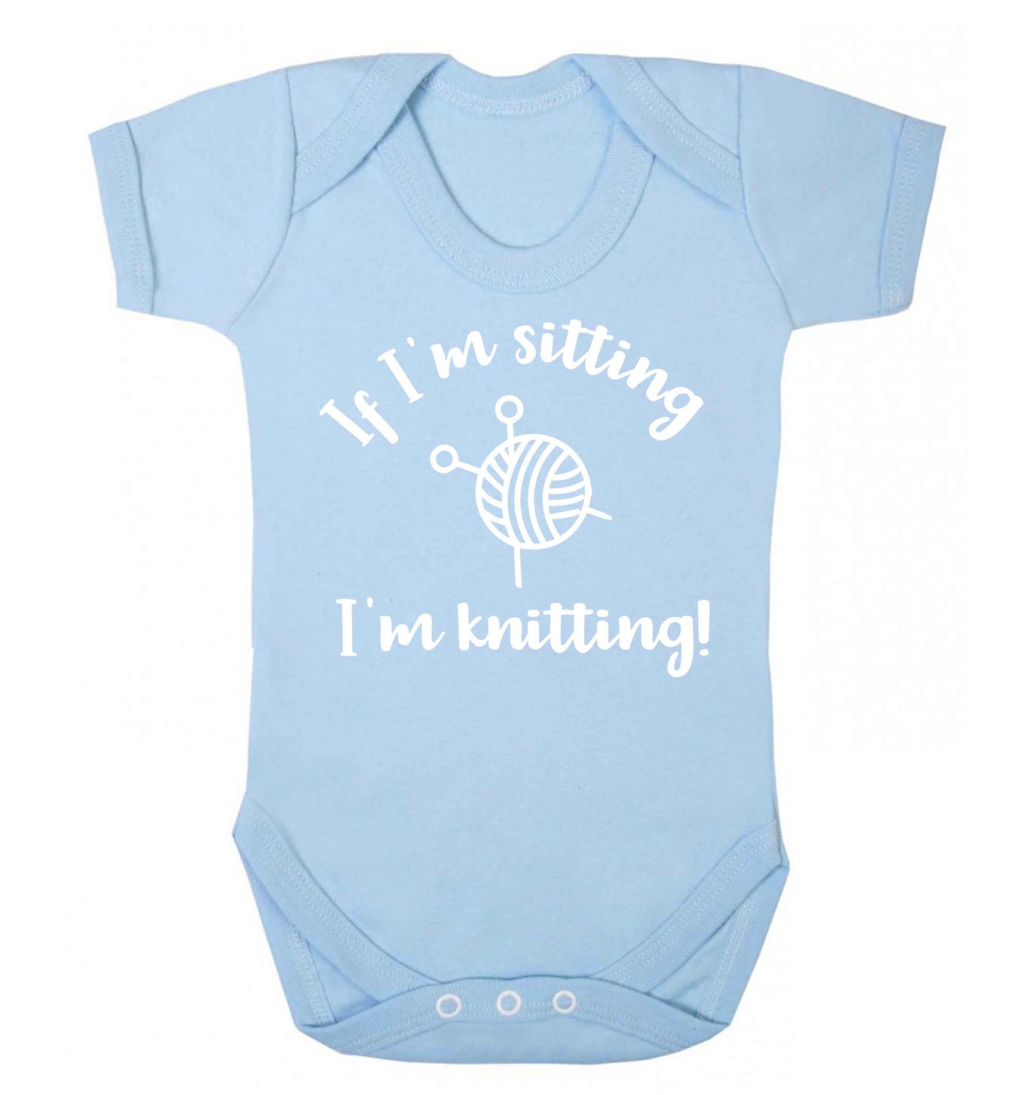 If I'm sitting I'm knitting Baby Vest pale blue 18-24 months