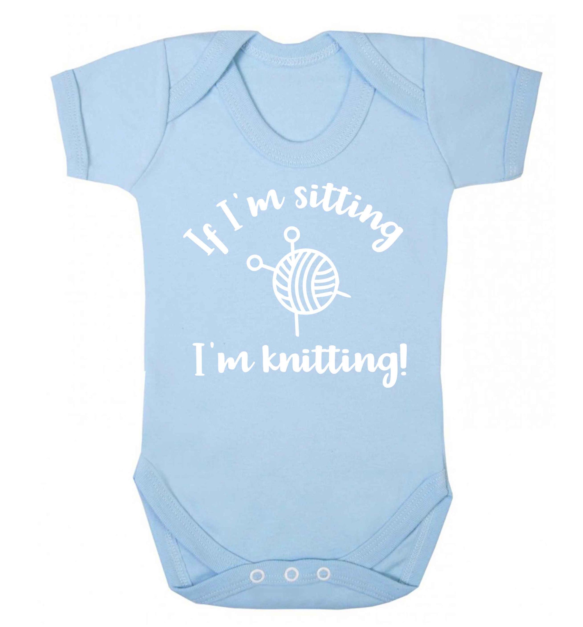 If I'm sitting I'm knitting Baby Vest pale blue 18-24 months