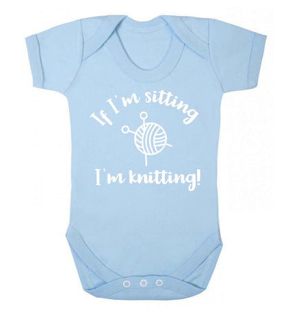 If I'm sitting I'm knitting Baby Vest pale blue 18-24 months