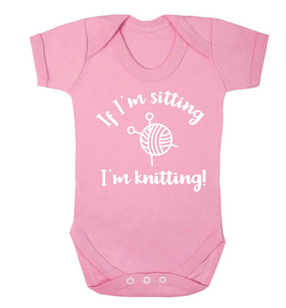 If I'm sitting I'm knitting Baby Vest pale pink 18-24 months