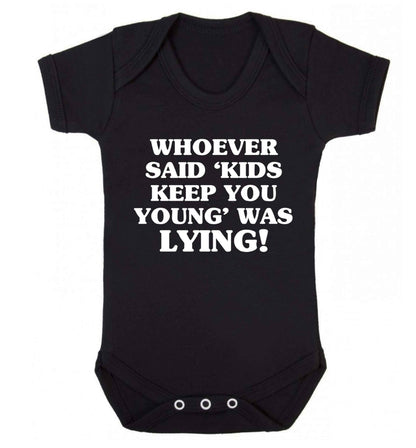 Whoever said 'kids keep you young' was lying! Baby Vest black 18-24 months