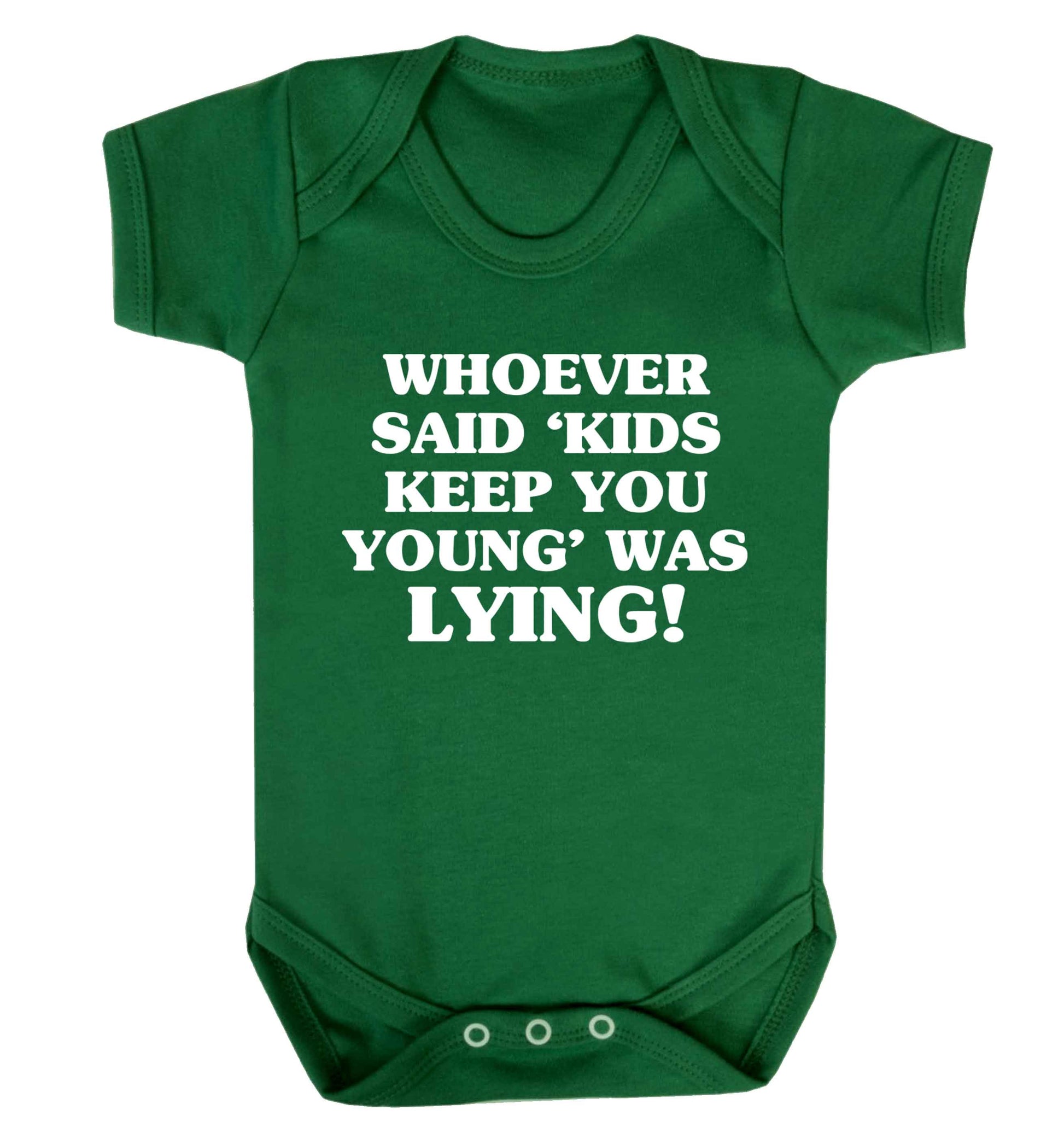 Whoever said 'kids keep you young' was lying! Baby Vest green 18-24 months