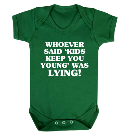 Whoever said 'kids keep you young' was lying! Baby Vest green 18-24 months
