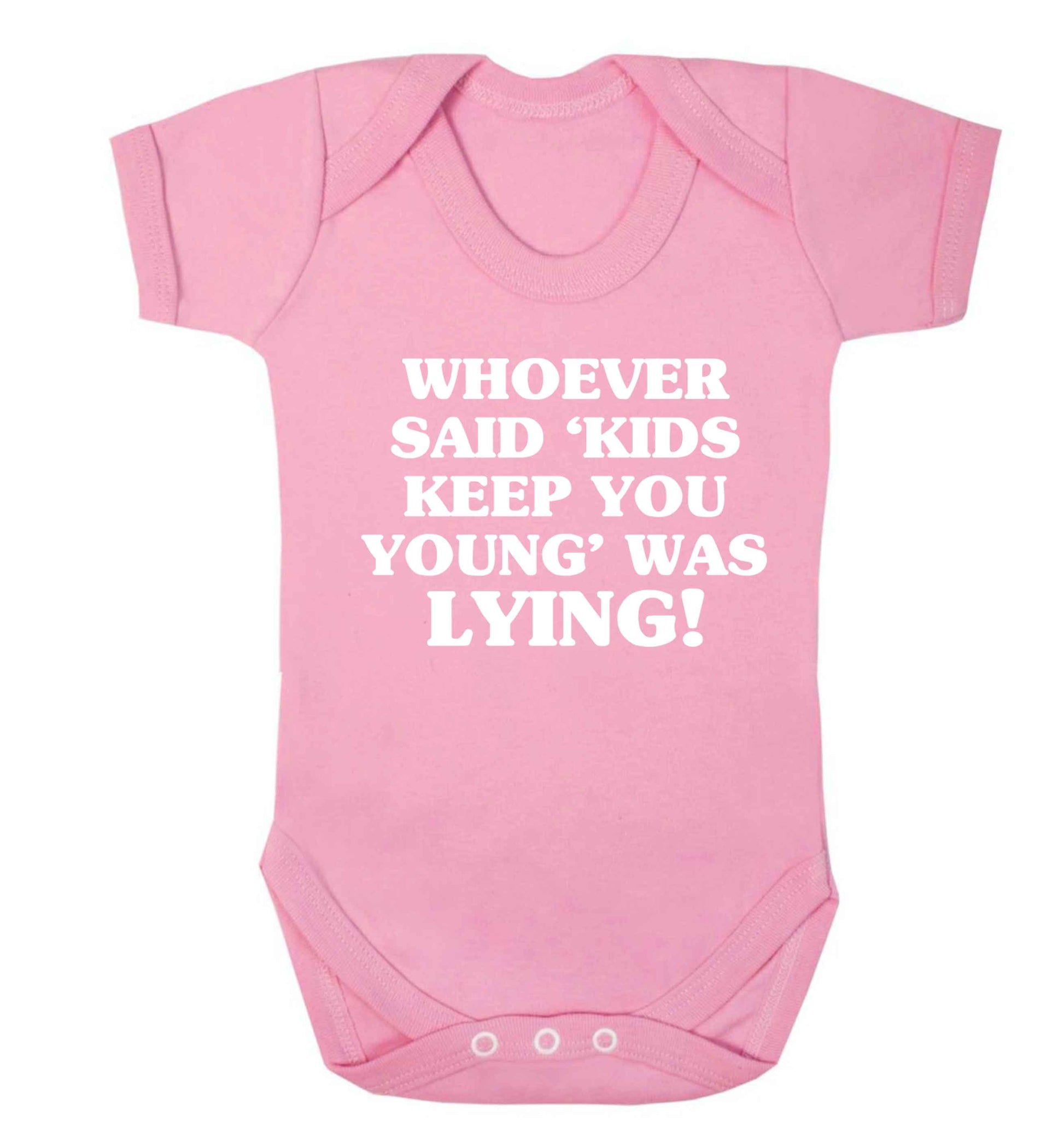 Whoever said 'kids keep you young' was lying! Baby Vest pale pink 18-24 months