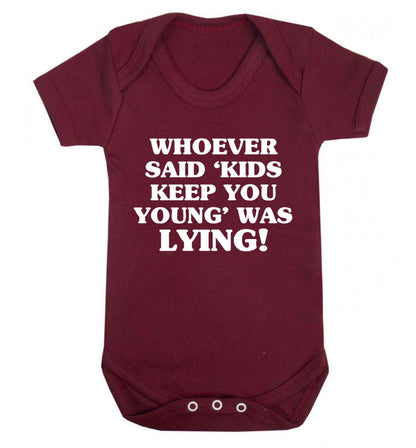 Whoever said 'kids keep you young' was lying! Baby Vest maroon 18-24 months
