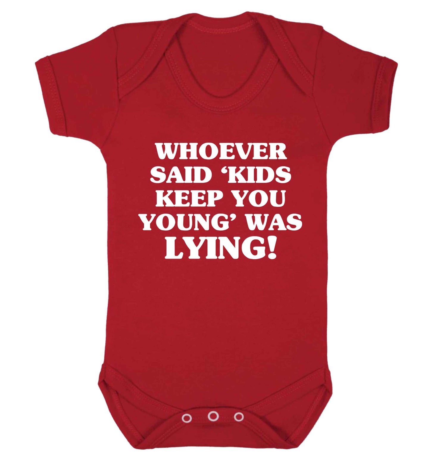 Whoever said 'kids keep you young' was lying! Baby Vest red 18-24 months