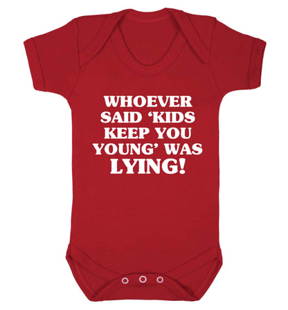 Whoever said 'kids keep you young' was lying! Baby Vest red 18-24 months