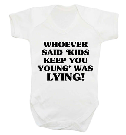 Whoever said 'kids keep you young' was lying! Baby Vest white 18-24 months