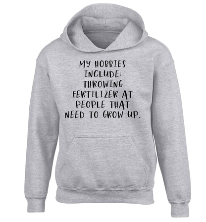 Throwing fertilizer at people that need to grow up children's grey hoodie 12-13 Years