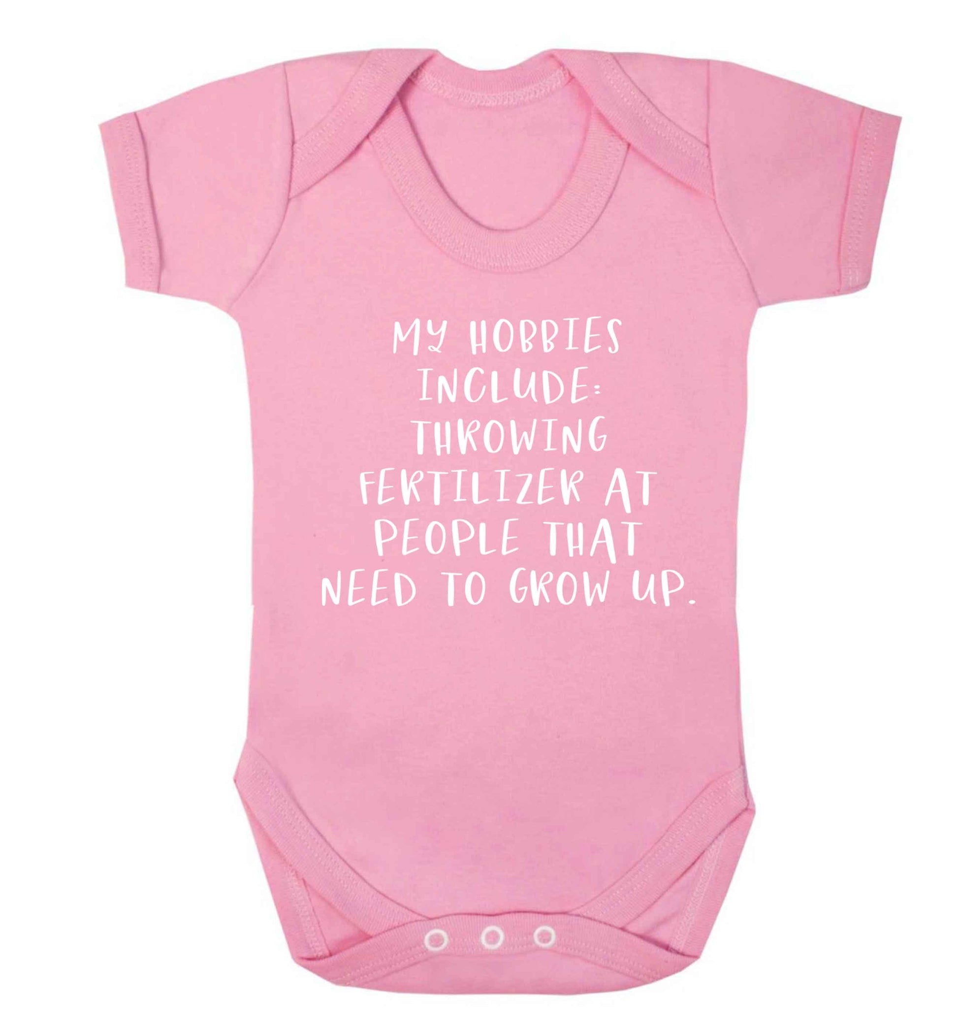 Throwing fertilizer at people that need to grow up Baby Vest pale pink 18-24 months