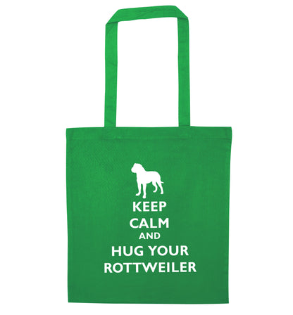 Keep calm and hug your rottweiler green tote bag