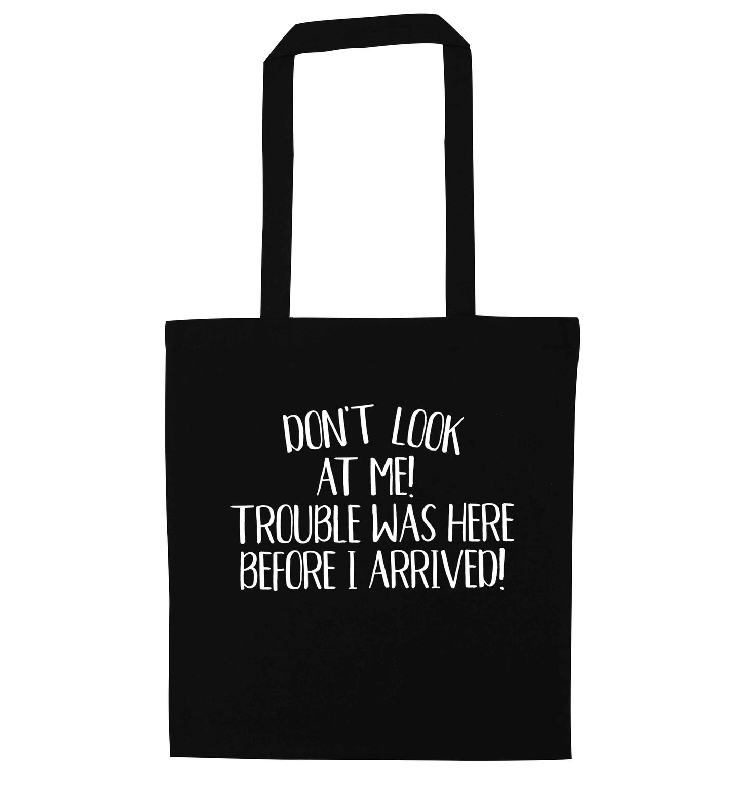 Don't look at me, trouble was here before I arrived! black tote bag