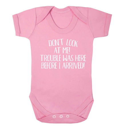 Don't look at me, trouble was here before I arrived! Baby Vest pale pink 18-24 months