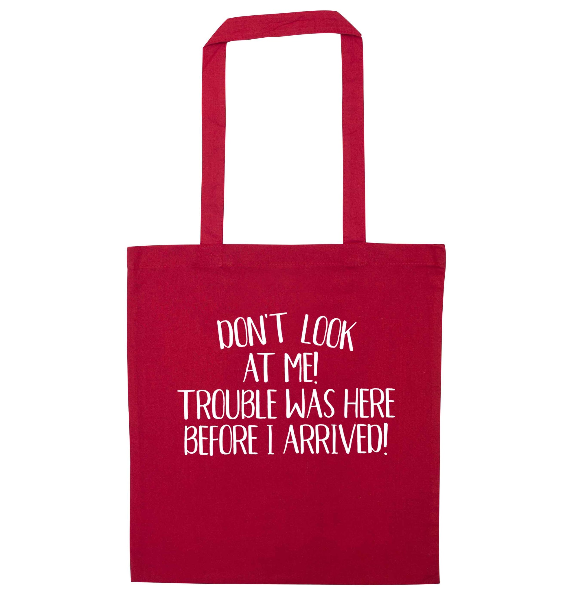 Don't look at me, trouble was here before I arrived! red tote bag