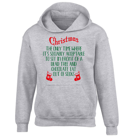 Christmas sit in front of a dead tree and eat chocolate out of socks children's grey hoodie 12-13 Years