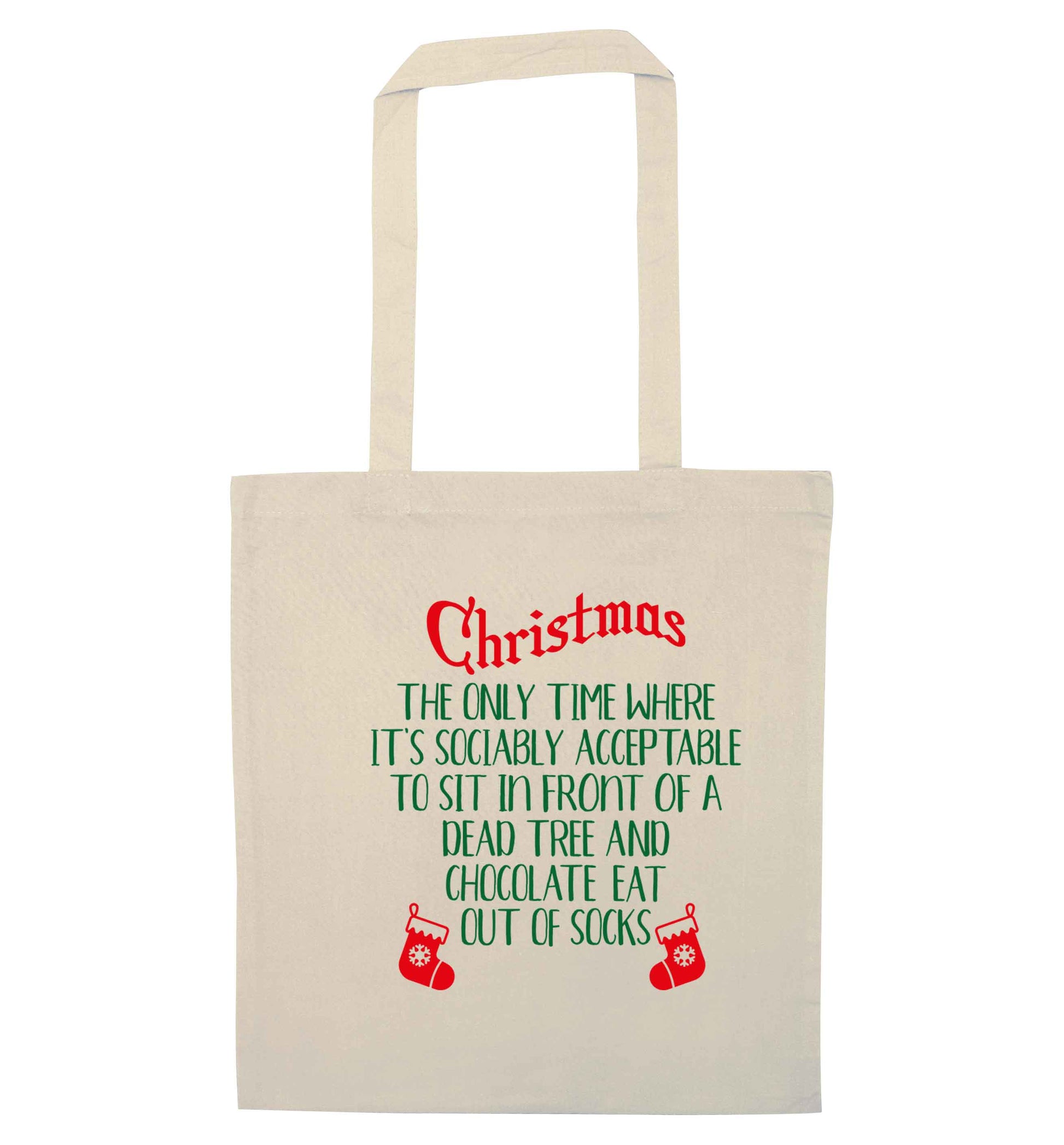 Christmas sit in front of a dead tree and eat chocolate out of socks natural tote bag