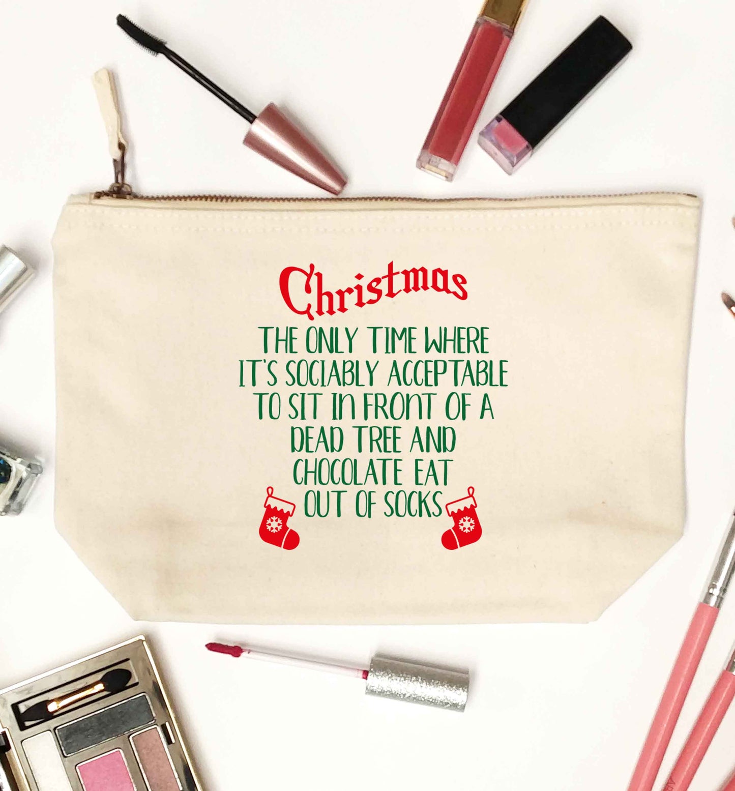 Christmas sit in front of a dead tree and eat chocolate out of socks natural makeup bag