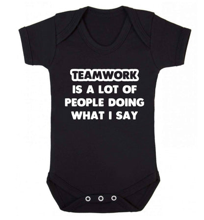 Teamwork is a lot of people doing what I say Baby Vest black 18-24 months