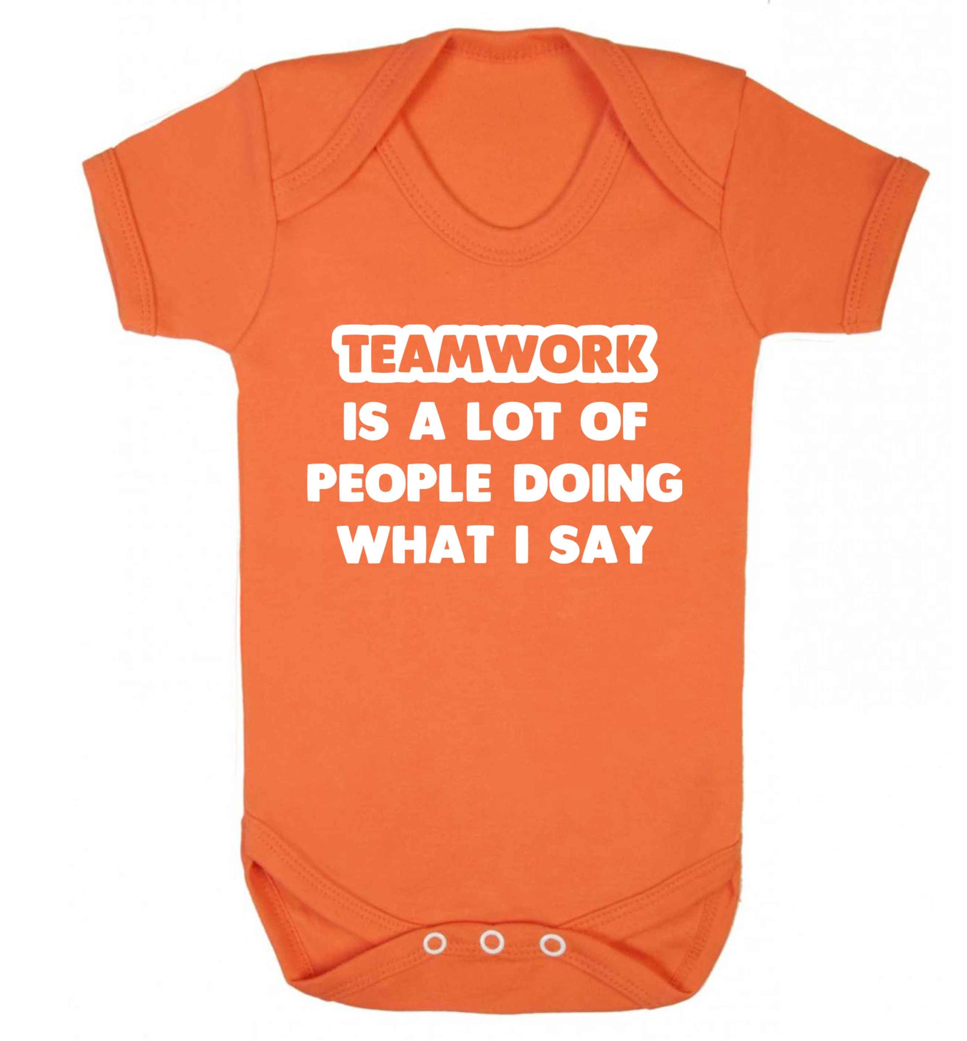 Teamwork is a lot of people doing what I say Baby Vest orange 18-24 months