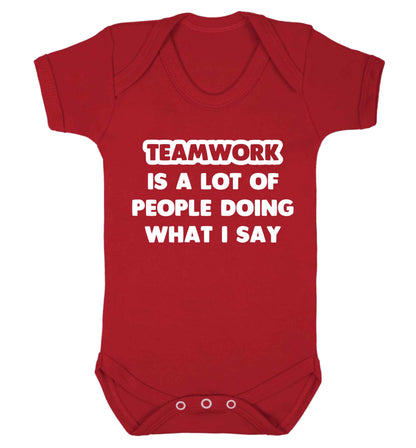 Teamwork is a lot of people doing what I say Baby Vest red 18-24 months