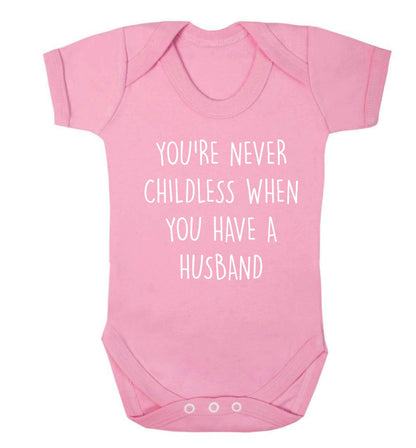 You're never childess when you have a husband Baby Vest pale pink 18-24 months