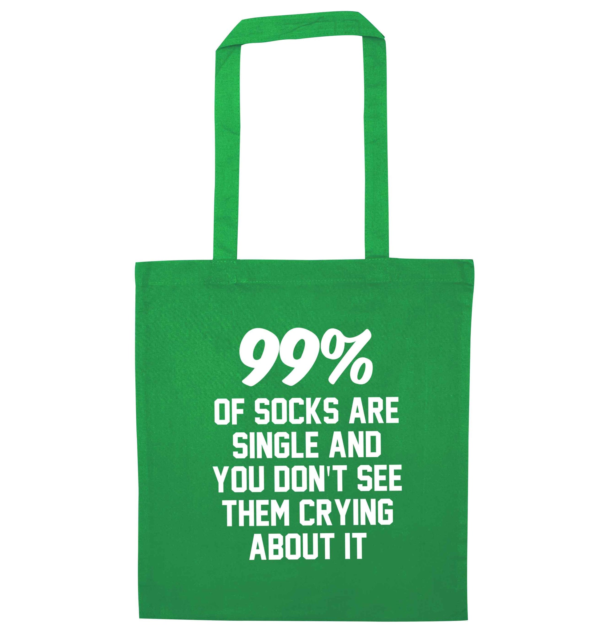 99% of socks are single and you don't see them crying about it green tote bag