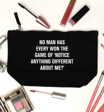 No man has ever won the game of 'notice anything different about me?' black makeup bag