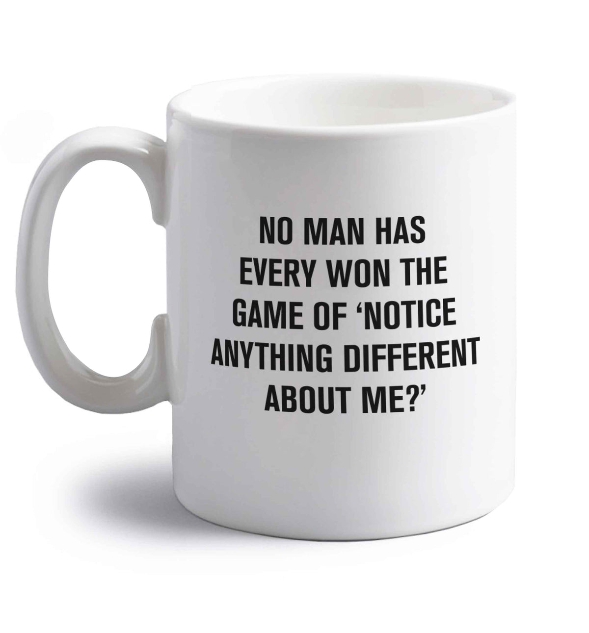 No man has ever won the game of 'notice anything different about me?' right handed white ceramic mug 