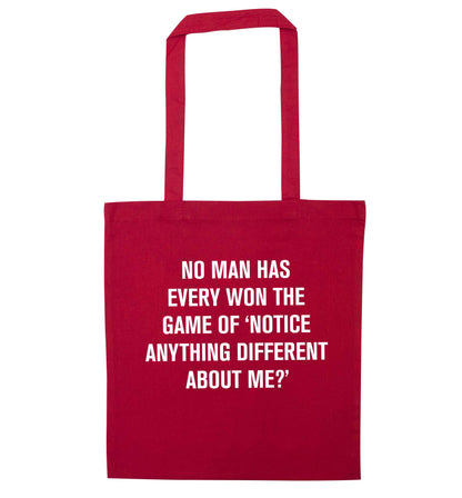 No man has ever won the game of 'notice anything different about me?' red tote bag