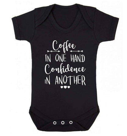 Coffee in one hand confidence in the other Baby Vest black 18-24 months