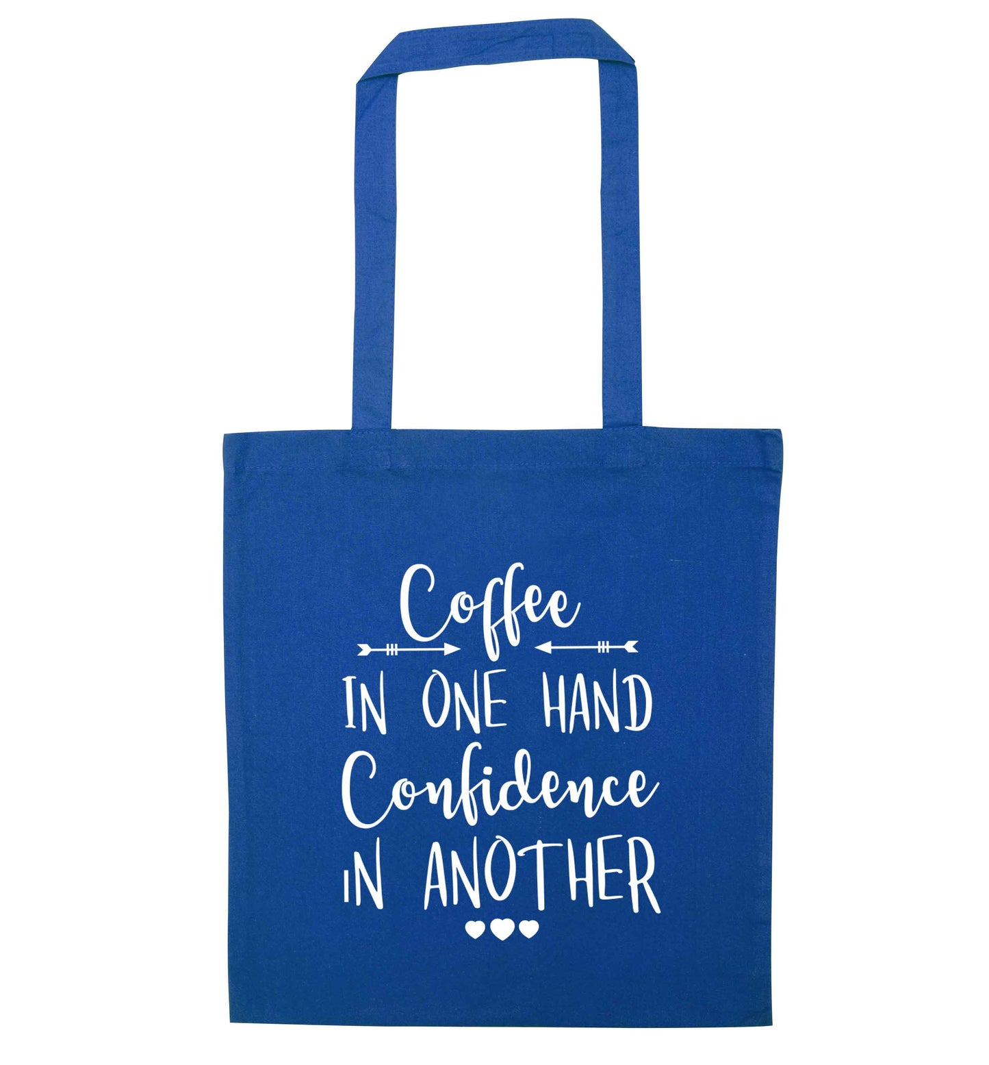 Coffee in one hand confidence in the other blue tote bag