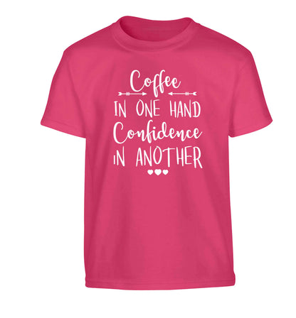 Coffee in one hand confidence in the other Children's pink Tshirt 12-13 Years