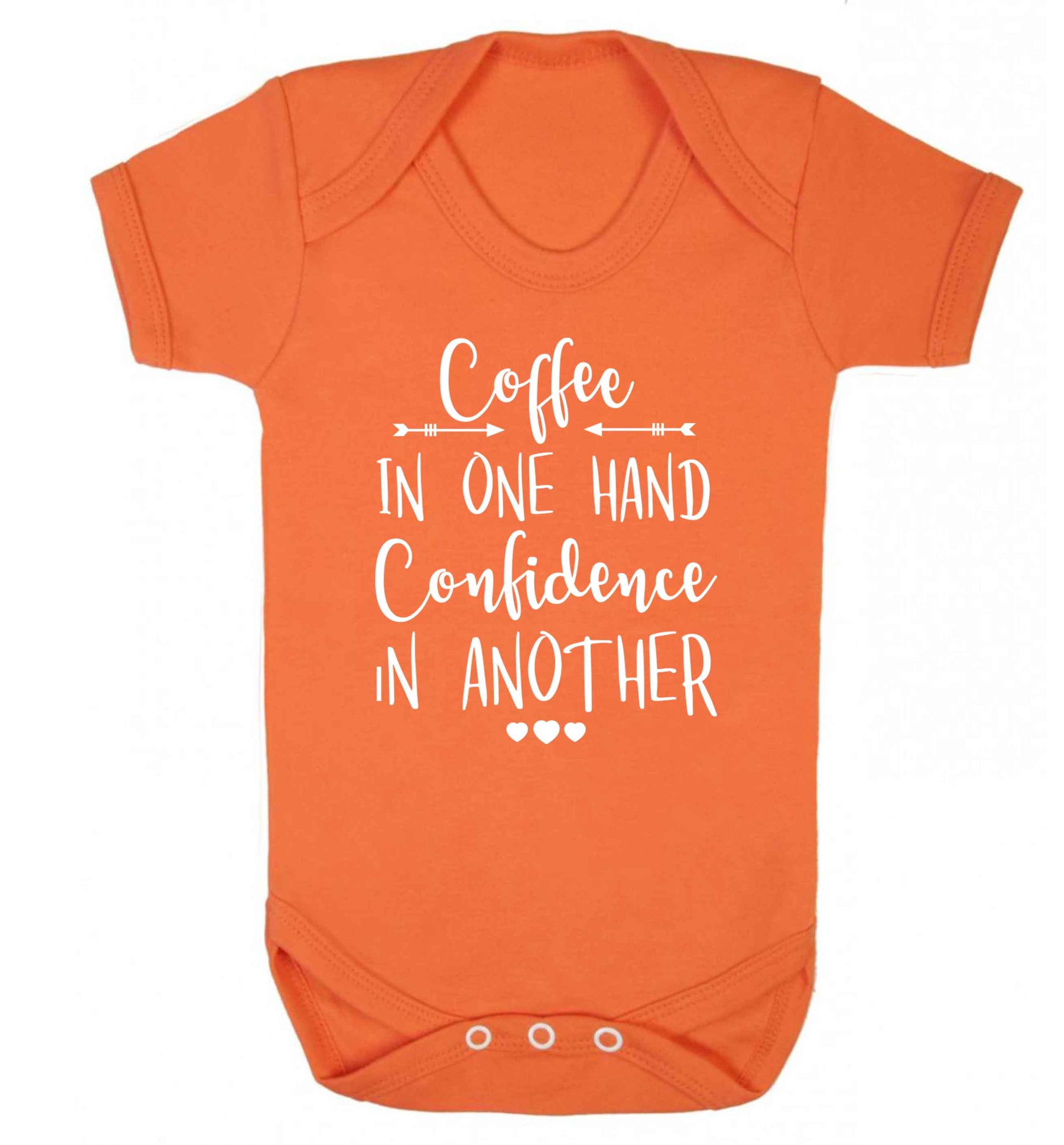 Coffee in one hand confidence in the other Baby Vest orange 18-24 months
