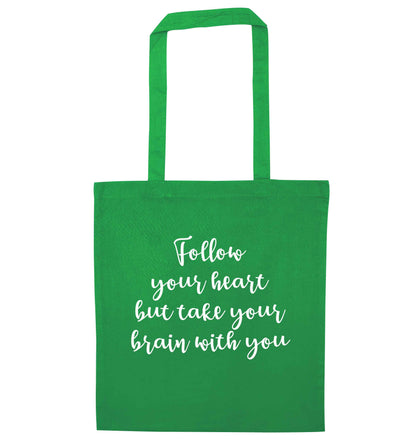 Follow your heart but take your head with you green tote bag