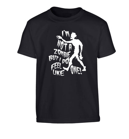 I'm not a zombie but I do feel like one! Children's black Tshirt 12-13 Years