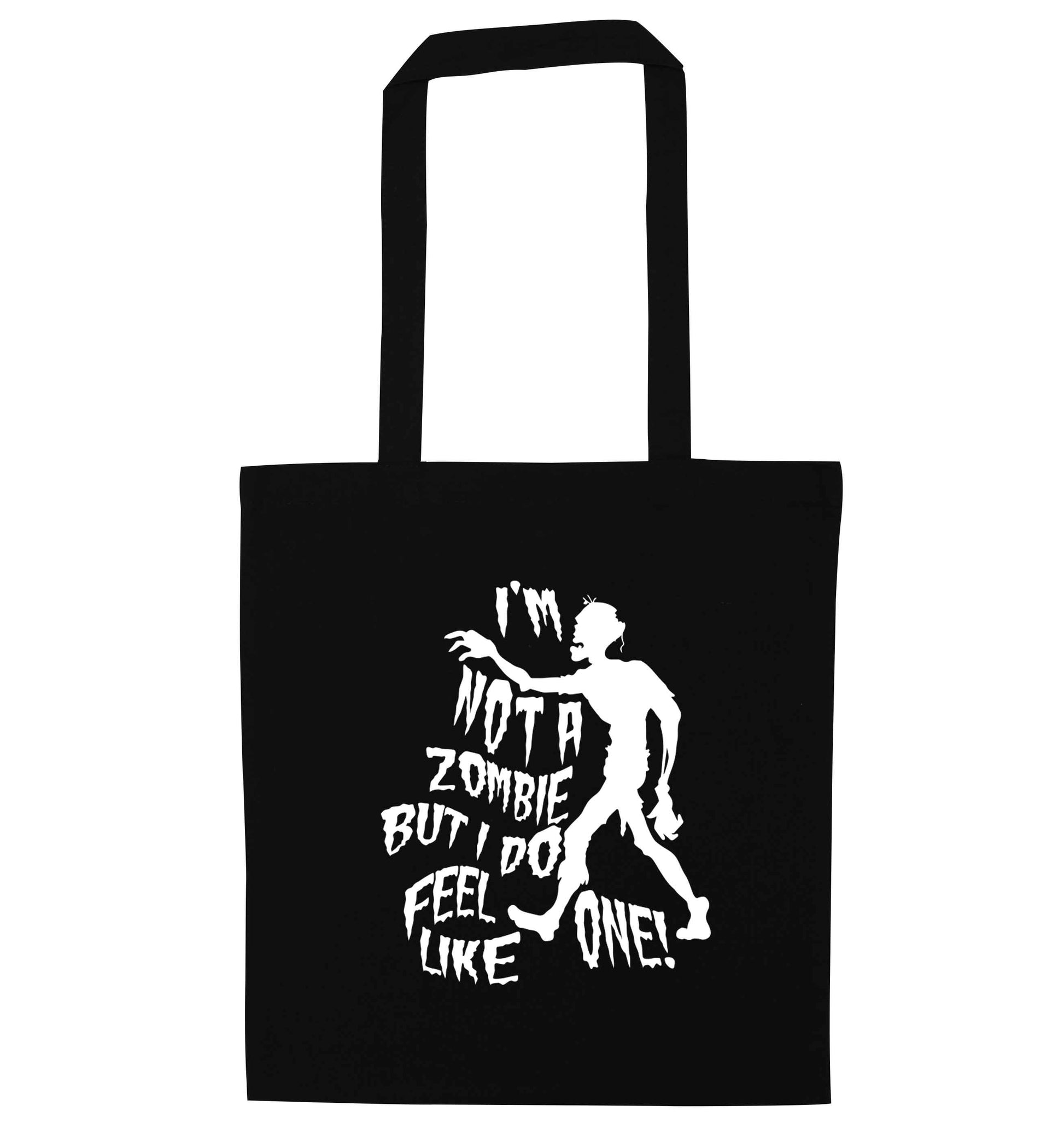 I'm not a zombie but I do feel like one! black tote bag